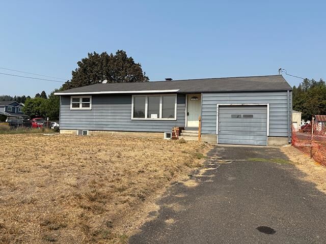 Property Photo: 8303 E Upriver Dr WA 99212