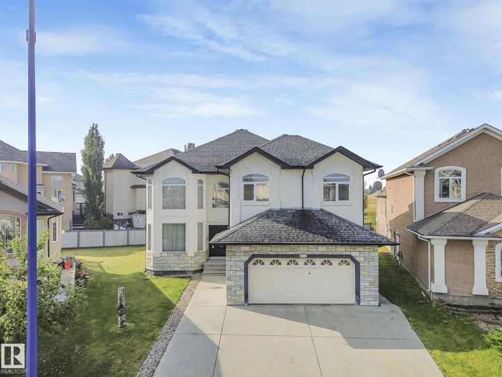 Property Photo:  6911 17 Av SW  AB T6X 0C9 