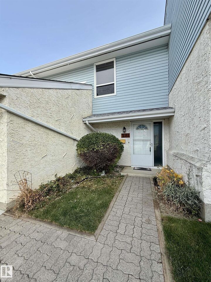 Property Photo: 221 Callingwood Place NW AB T5T 2C6