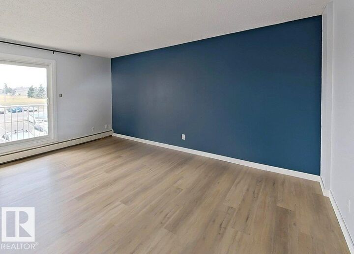 Property Photo:  11245 31 Avenue NW 21  AB T6J 3V5 