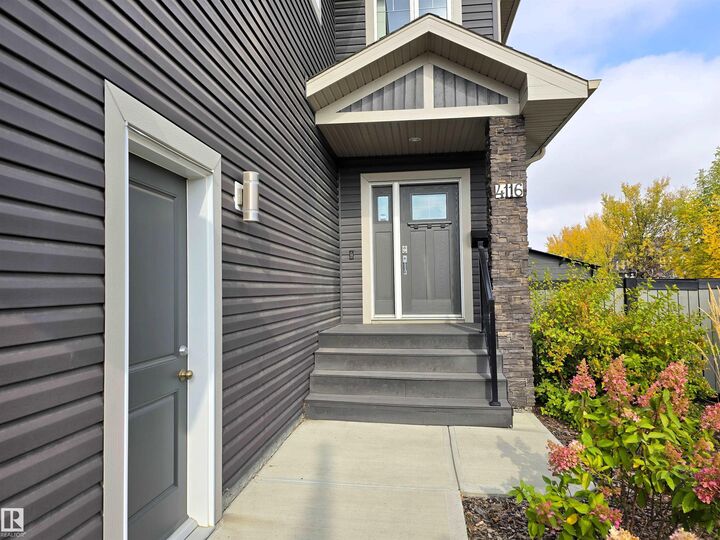 Property Photo: 4116 Summerland Drive AB T8H 0R1