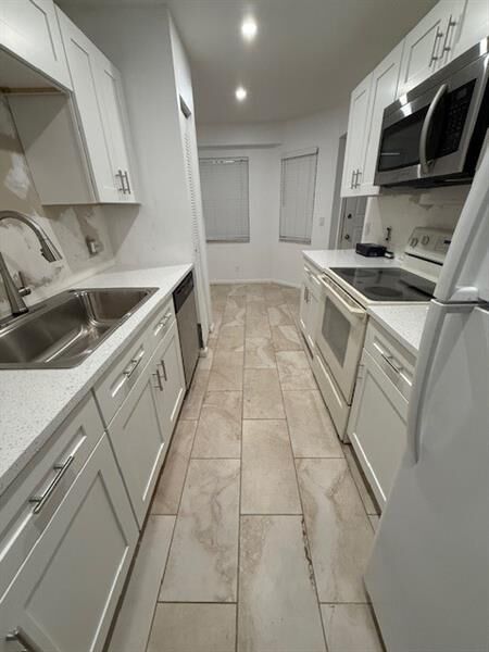 Property Photo: 1200 SW 124th Ter 405 FL 33027