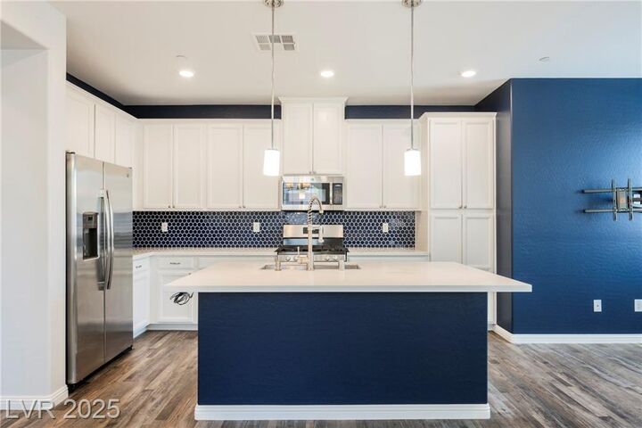 Property Photo:  8493 Insignia Avenue 102  NV 89178 