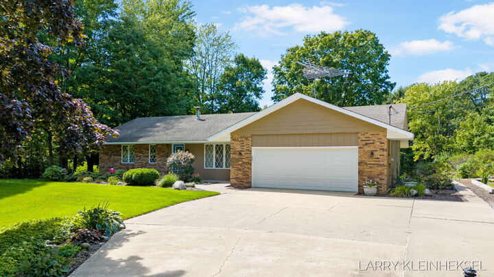 Property Photo:  5195 Sand Drive  MI 49460 