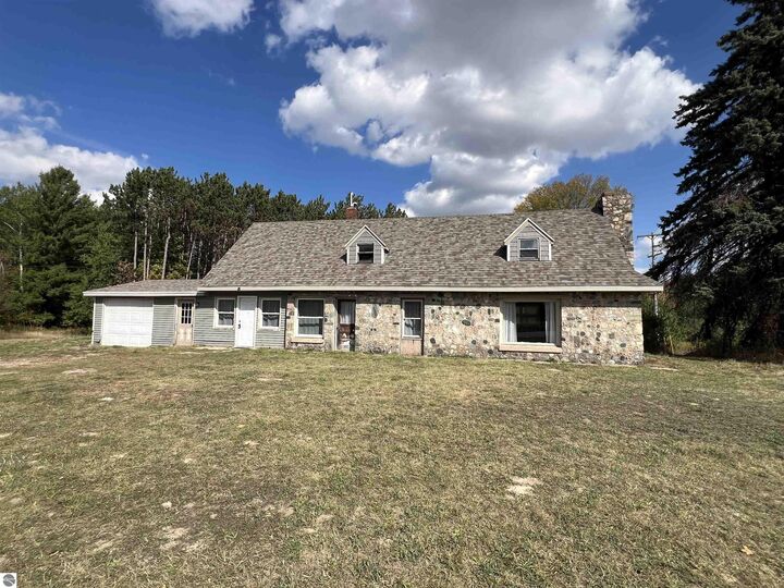 Property Photo:  9861 E M-115  MI 49601