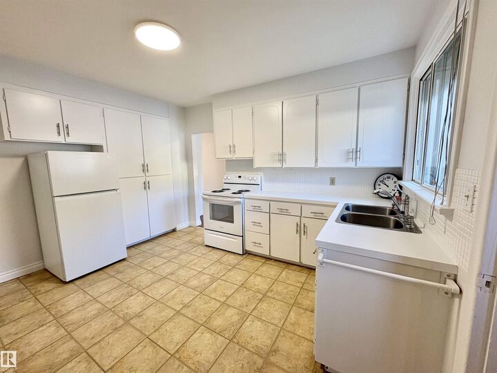 Property Photo: 12050 56 Street NW AB T5W 3T1