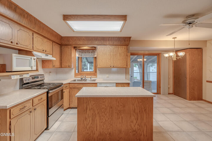Property Photo:  2106 Assumption Drive  ND 58501 