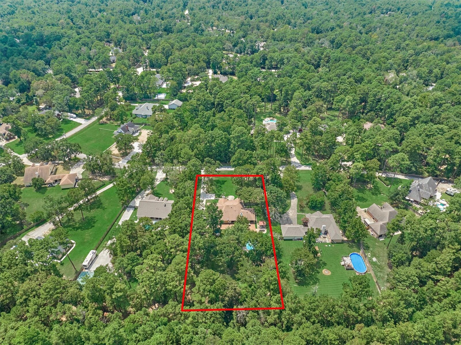 Property Photo:  8 Wind River Court  TX 77384 