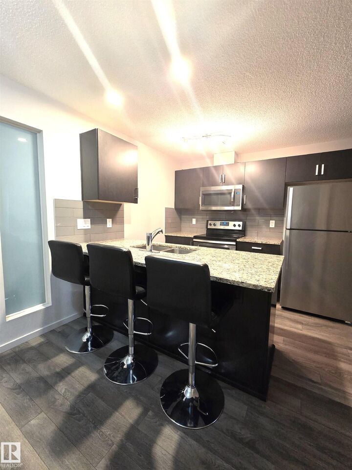 Property Photo: 390 Windermere Road NW 332 AB T6W 0R1