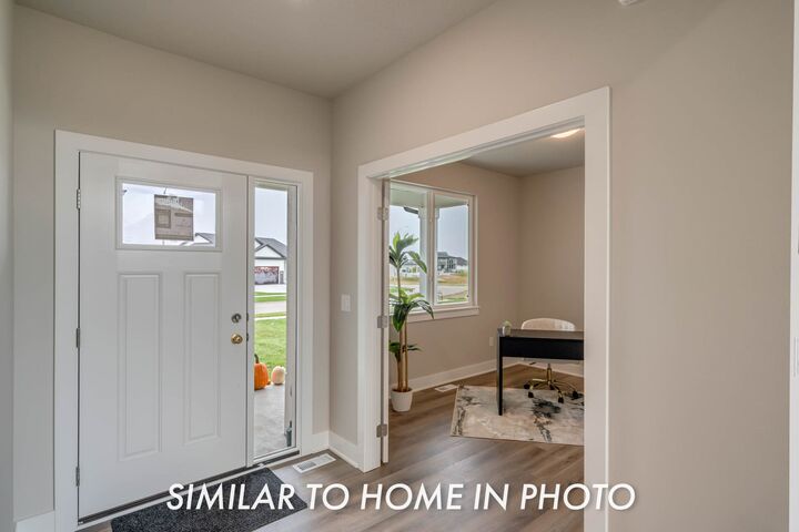 Property Photo: 209 Timberview Circle IA 50219