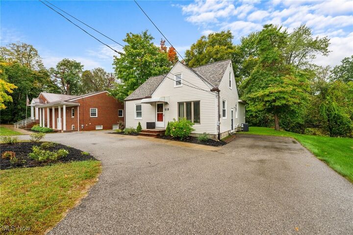Property Photo:  6950 Hopkins Road  OH 44060 