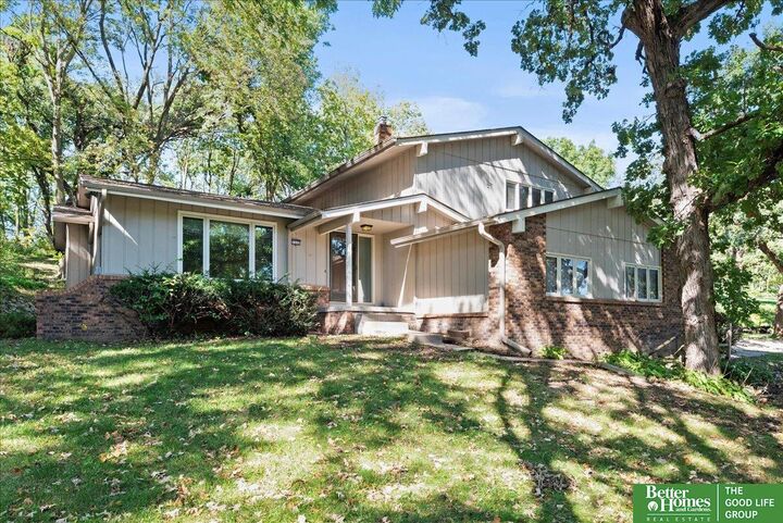 Property Photo: 9242 Raven Oaks Drive NE 68152