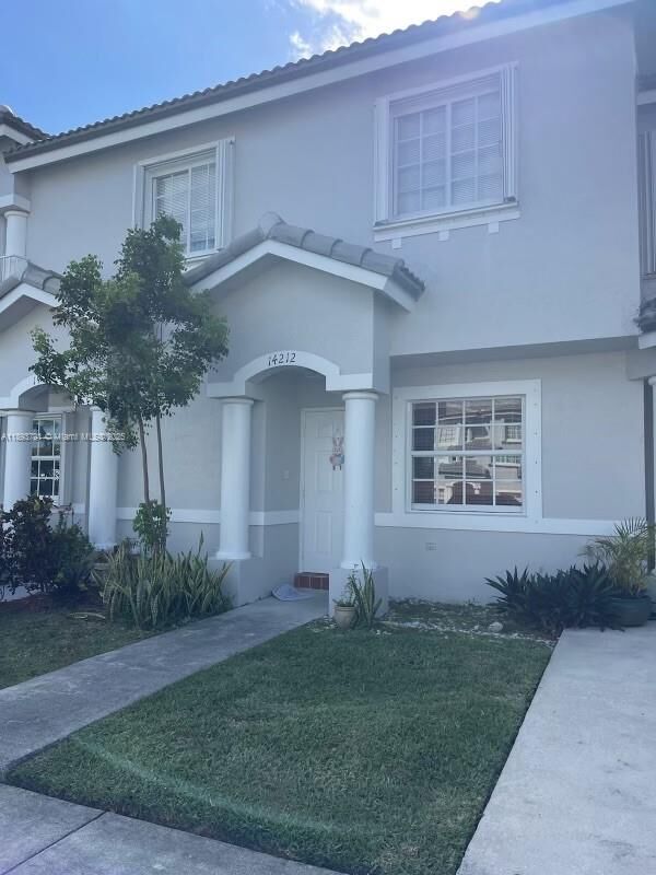 Property Photo: 14212 SW 121st Pl 6 FL 33186