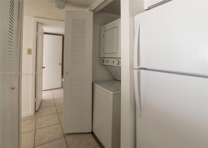 Property Photo:  10630 SW 157 Ct 203  FL 33196 
