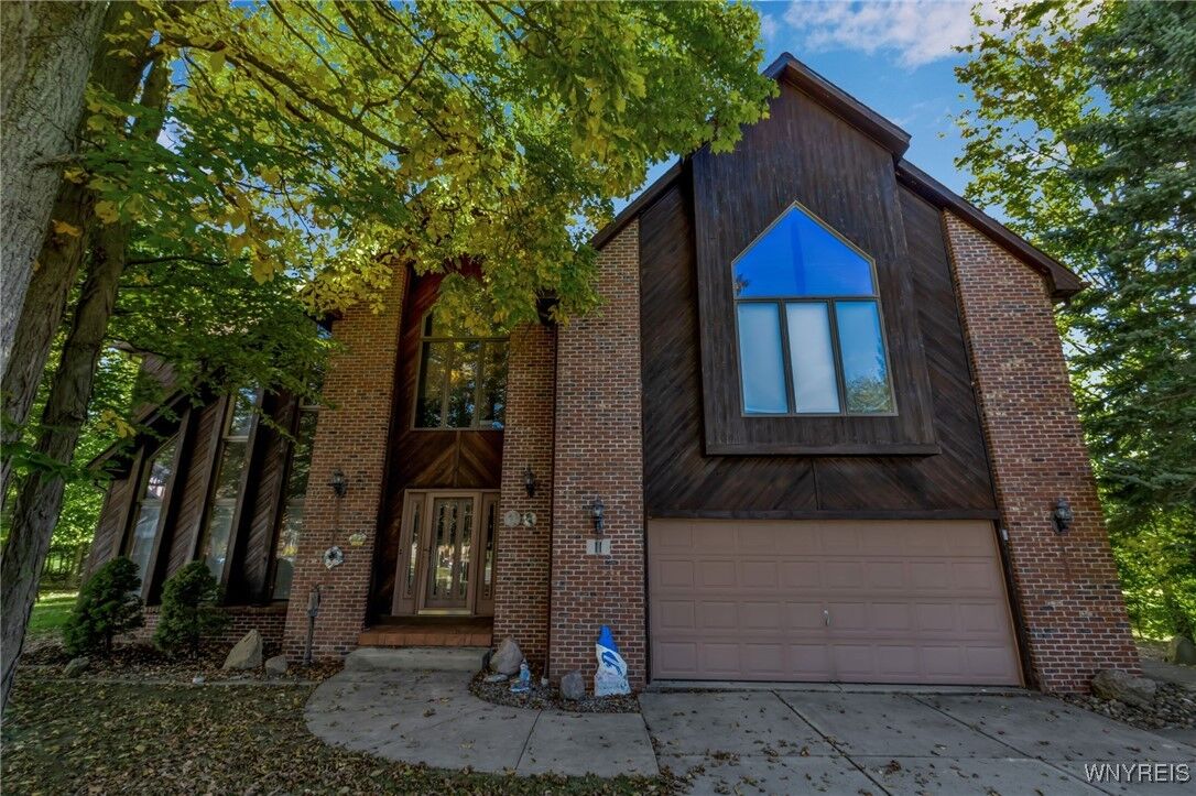 Property Photo: 11 Cidermill Court NY 14043