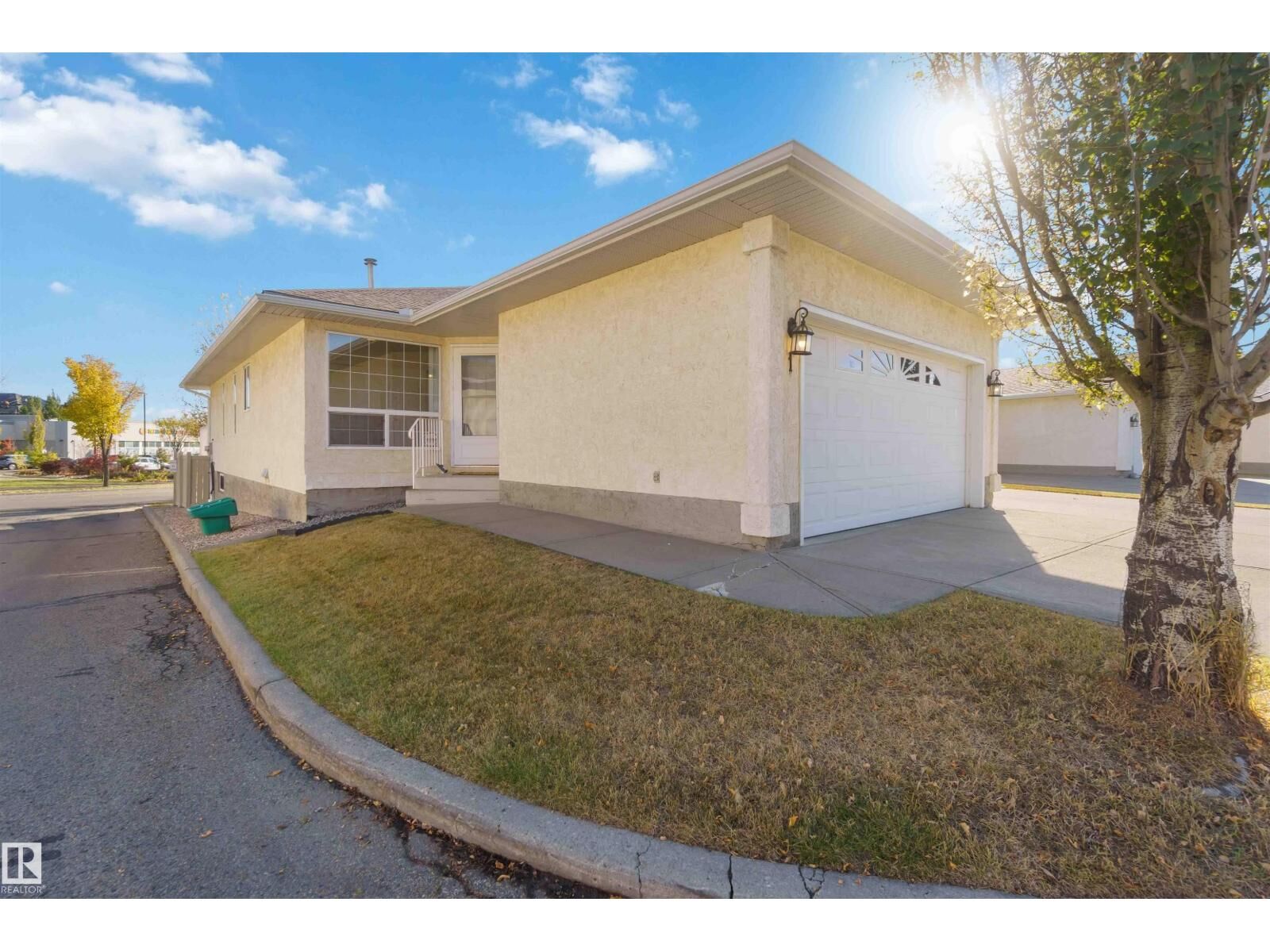 Property Photo: #1 14428 Miller Bv NW AB T5Y 2Y6