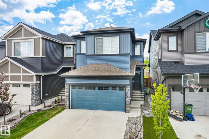 Property Photo:  22143 80 Avenue NW  AB T5T 4S2 