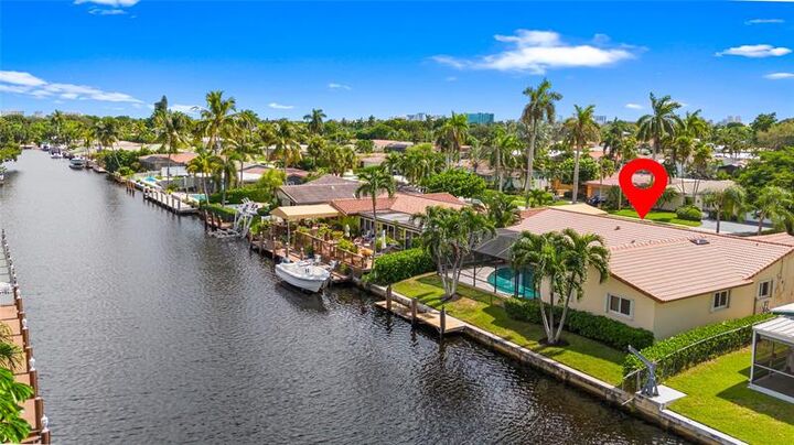 Property Photo: 1419 NE 57th Pl FL 33334