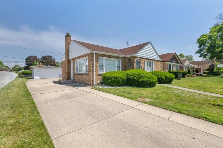 Property Photo:  8841 Menard Avenue  IL 60053 