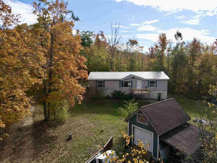 Property Photo: 8464 Hidden Spring MI 49730