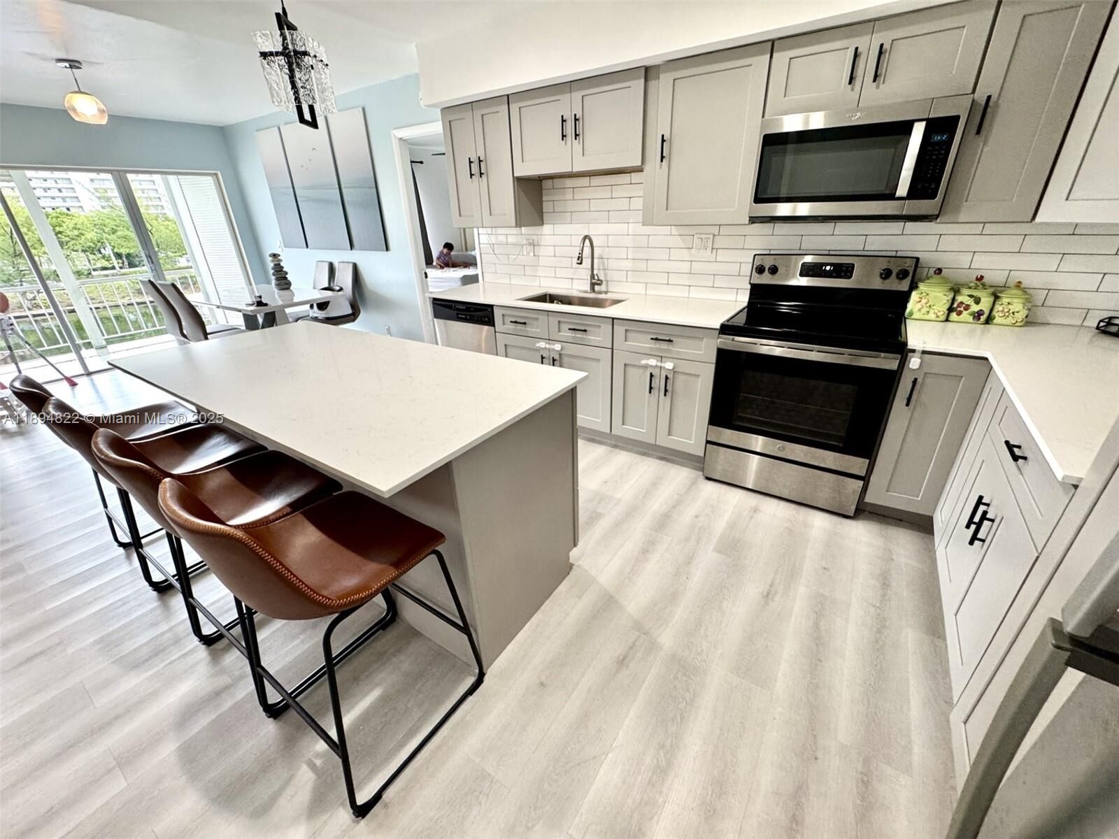 Property Photo:  400 Diplomat Pkwy 410  FL 33009 