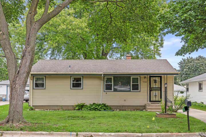Property Photo:  7068 N 38th Ct  WI 53209 