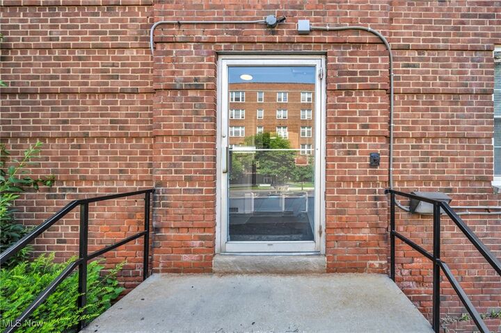Property Photo: 13800 Fairhill Road 520 OH 44120