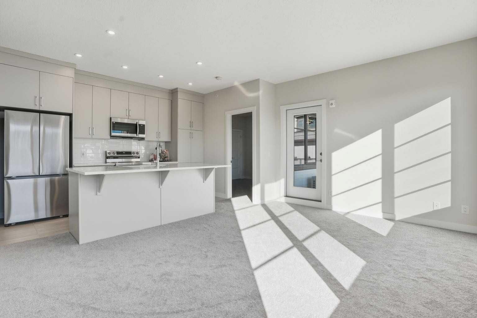 Property Photo:  2117 81 Street SW 2417  AB T3H 6H5 