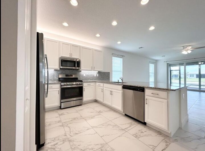 Property Photo:  11650 SW Moon River Way  FL 34987 