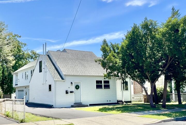 Property Photo:  33 Elm Tree Place Front House  CT 06906 