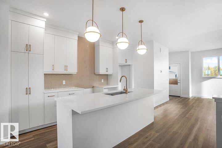 Property Photo: 9125 Elves Loop NW AB T6M 3G2