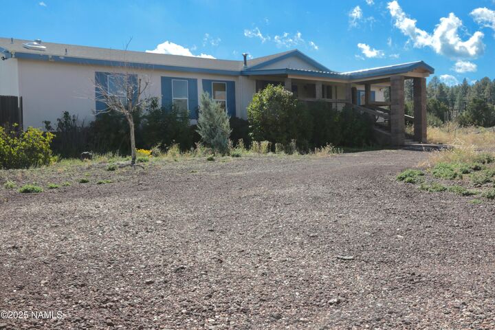Property Photo: 7700 E Creekside Drive AZ 86004