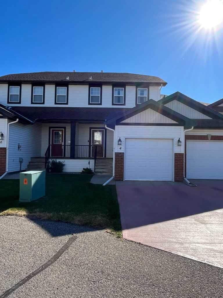 Property Photo: 295 Blackfoot Road W 4 AB T1K 8A6