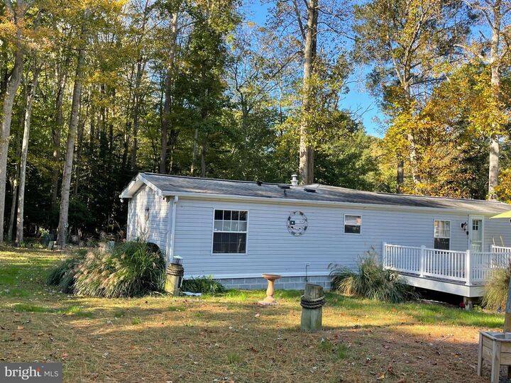 Property Photo: 22926 Cypress Drive DE 19958