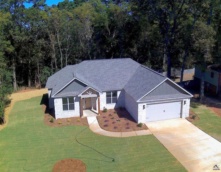 Property Photo:  404 Minter Drive  GA 31088 