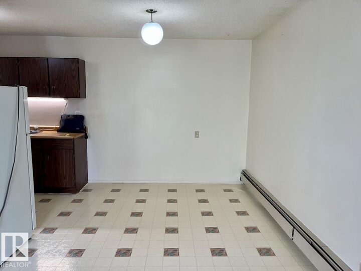 Property Photo:  9405 94 Avenue 302  AB T8L 1N6 