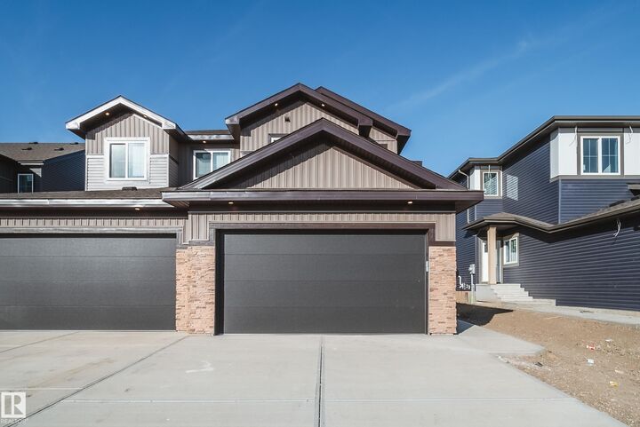 Property Photo:  18 Blackbird Bend  AB T8L 0G6 