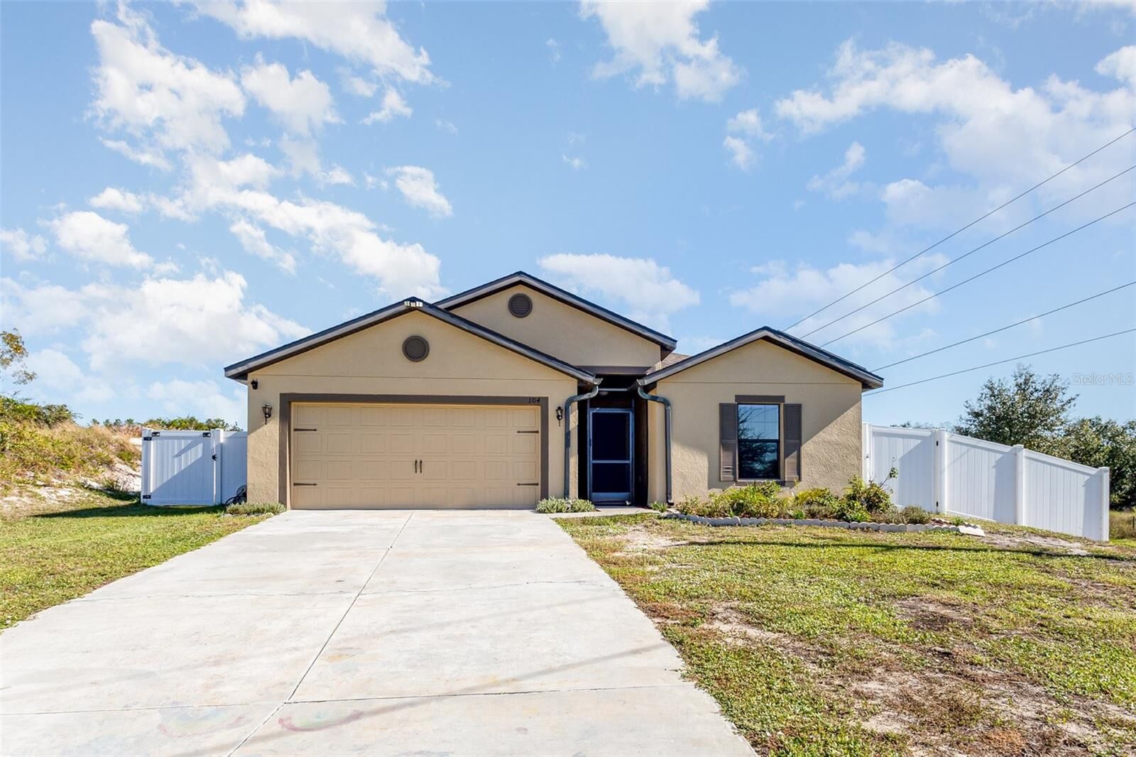 Property Photo: 104 Jasmine Circle FL 34759