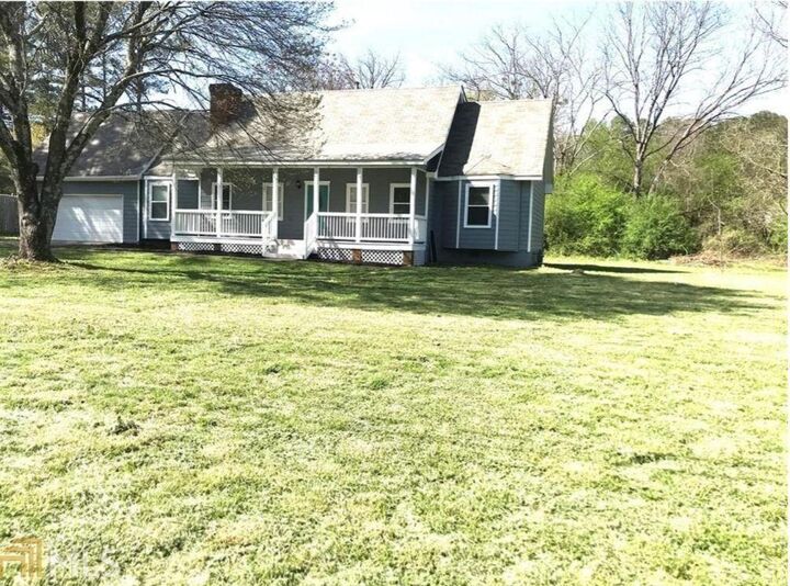 Property Photo: 6744 Rockbridge Road GA 30087