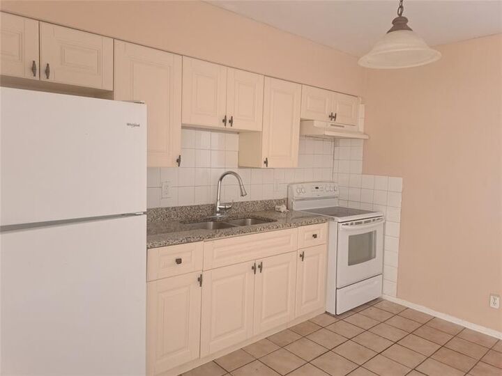 Property Photo:  4070 NW 30th Ter. 1  FL 33309