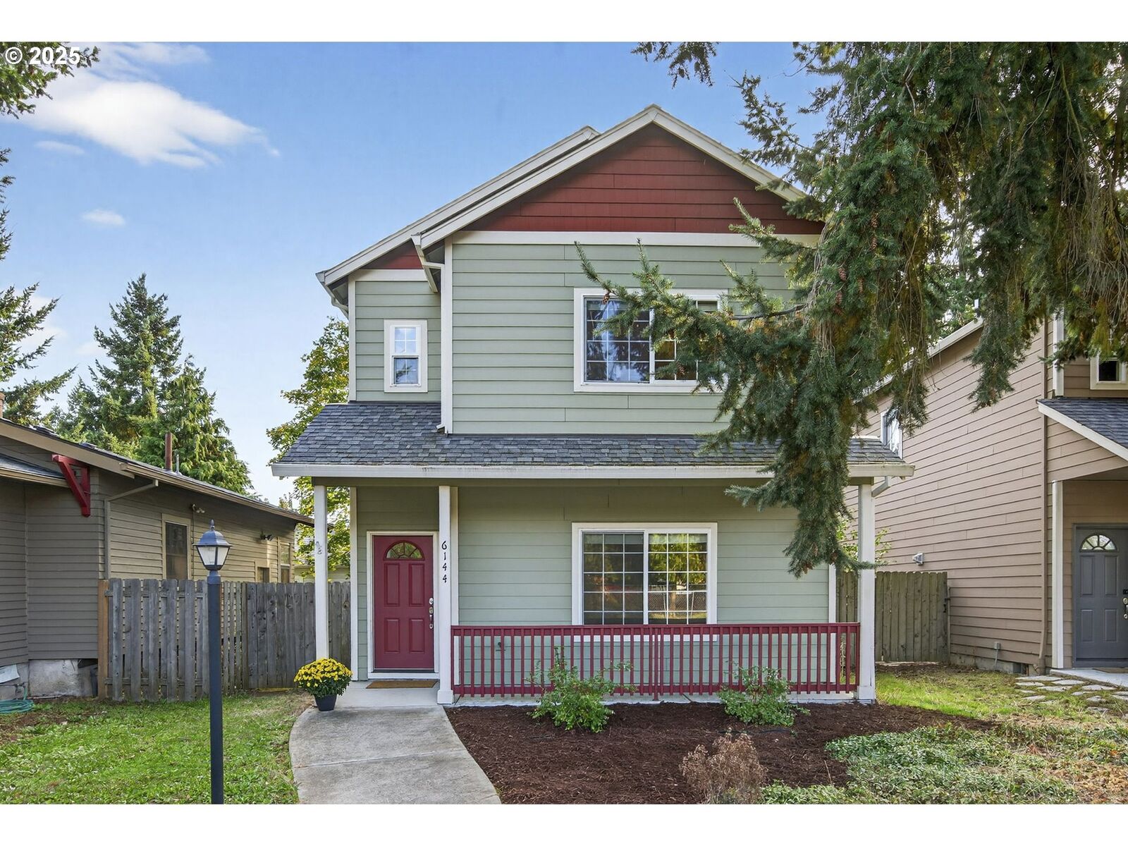 Property Photo:  6144 SE Duke St  OR 97206