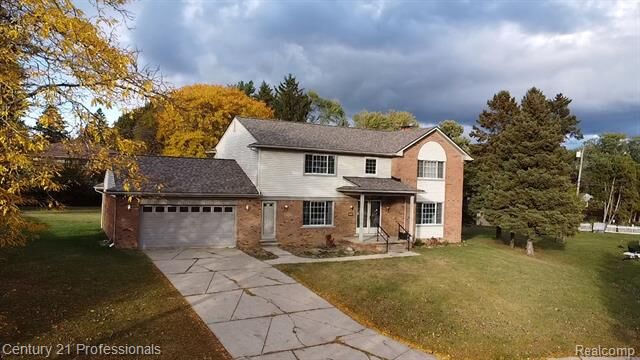 Property Photo:  100 Longford Drive  MI 48309
