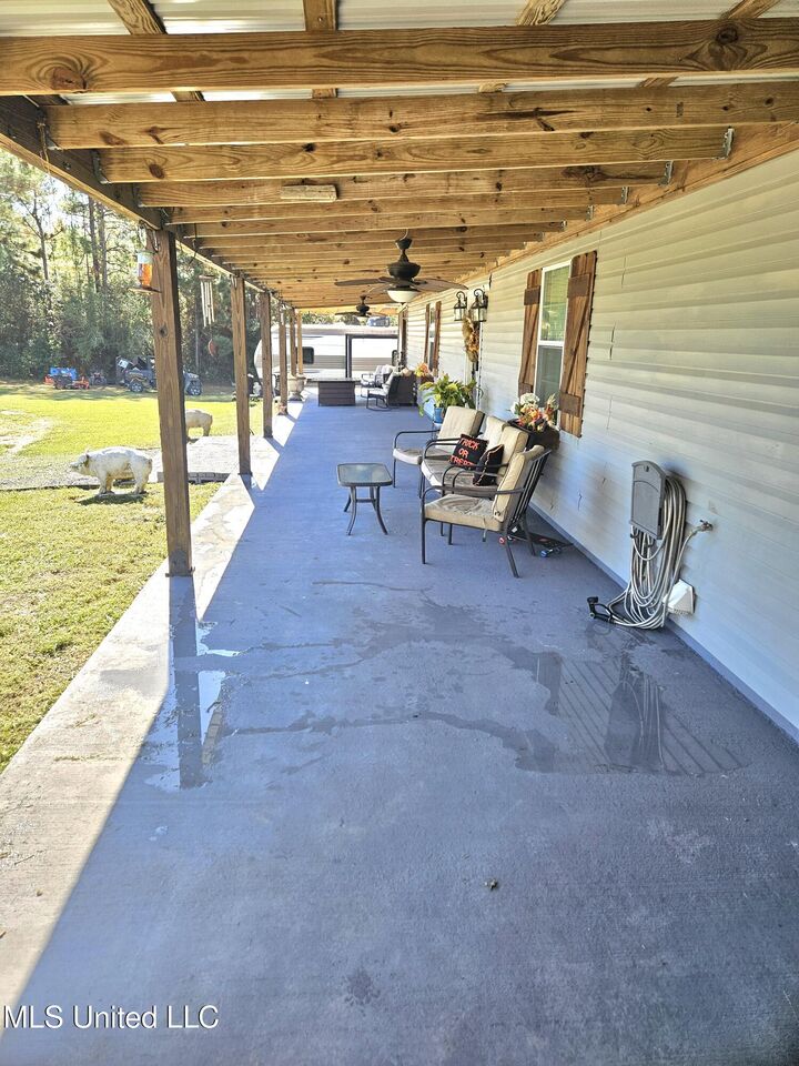 Property Photo: 27588 E Lake Cypress Drive MS 39573