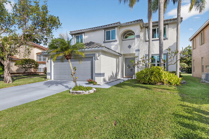 Property Photo:  3943 Westchester Way  FL 33436