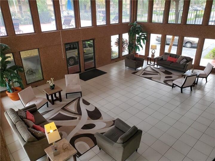 Property Photo: 9233 SW 8th St 220 FL 33428