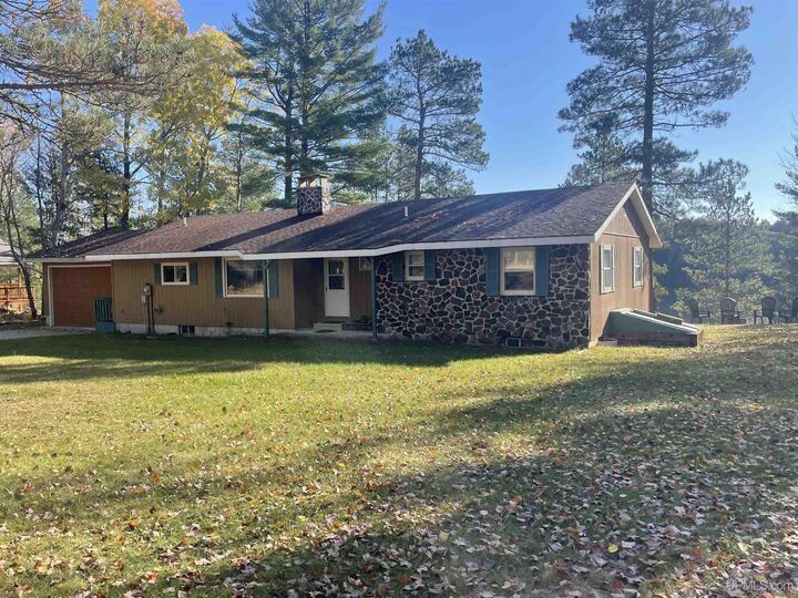Property Photo:  8301 Mirror Lake Road  MI 49862 