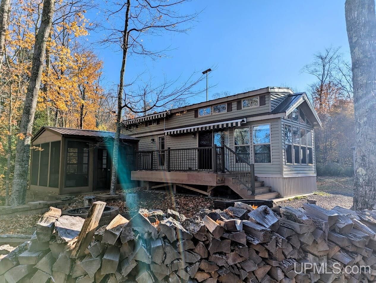 Property Photo:  44017 Ten Mile Point Road  MI 49953 