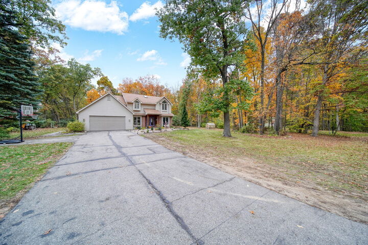 Property Photo:  7142 Foxmoore Court  MI 49201