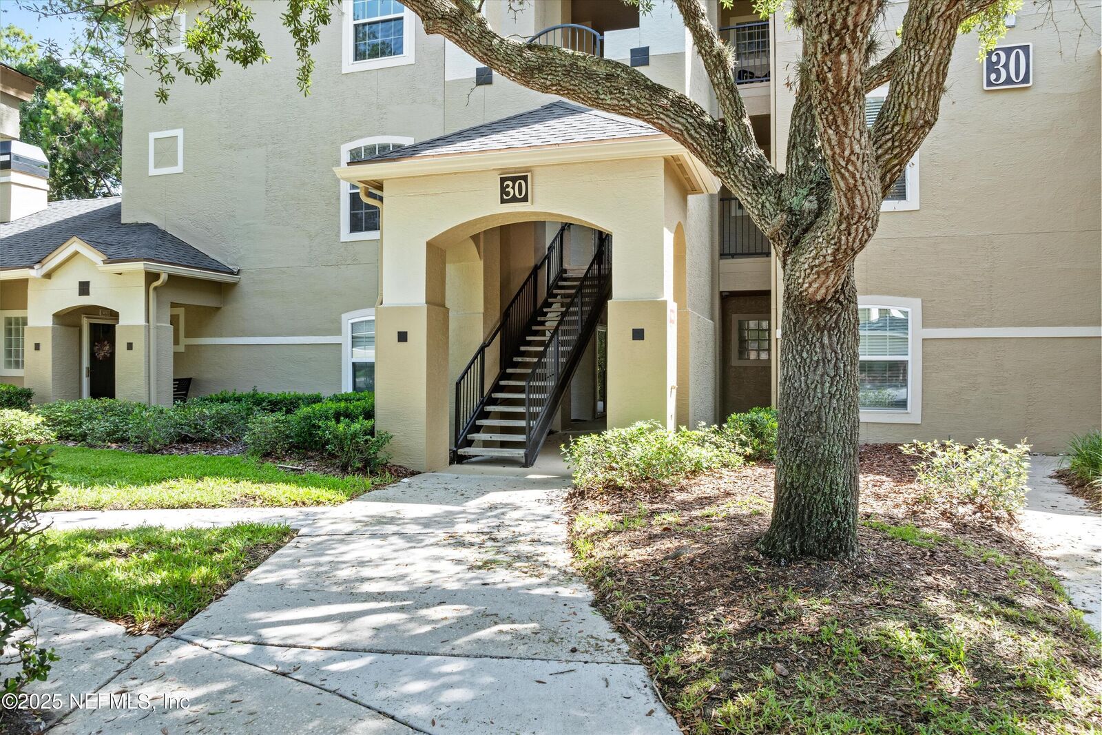 Property Photo:  1655-A The Greens Way 3021  FL 32250 