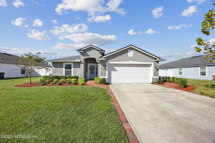 Property Photo:  95227 Windflower Trail  FL 32034 